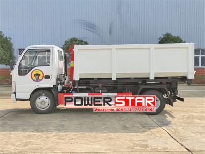 ISUZU NKR hook loader with garbage compactor