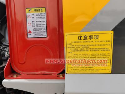 Isuzu 700P 4x4 rear loader compactor truck