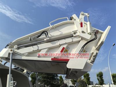 Isuzu NKR 100P garbage compactor truck