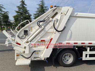 Isuzu NKR 100P garbage compactor truck