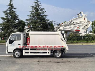 Isuzu NKR 100P garbage compactor truck