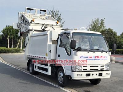 Isuzu NKR 100P garbage compactor truck