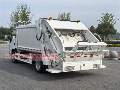 Isuzu NKR 100P garbage compactor truck