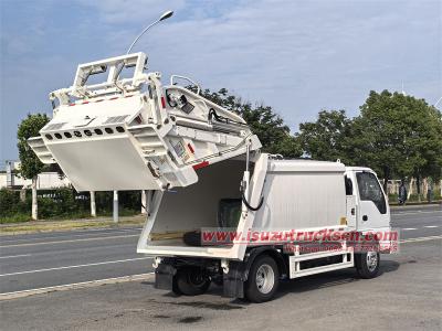 Isuzu NKR 100P garbage compactor truck