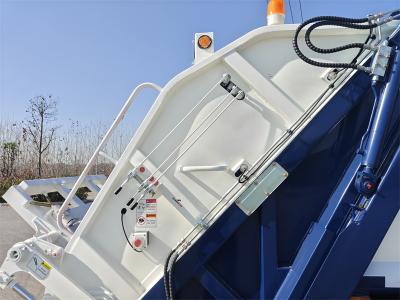 Isuzu EVM600 6cbm electric rear loader truck