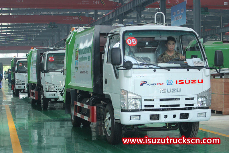 10 units ISUZU 4x2 garbage compactor truck are shipped into 40 HQ container