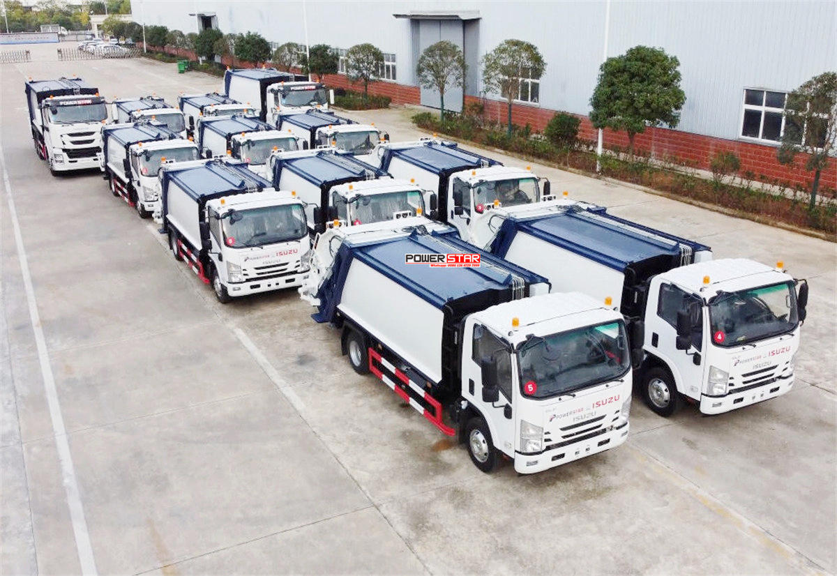 Dominica - 15 units ISUZU garbage compactor trucks delivered from POWERSTAR
